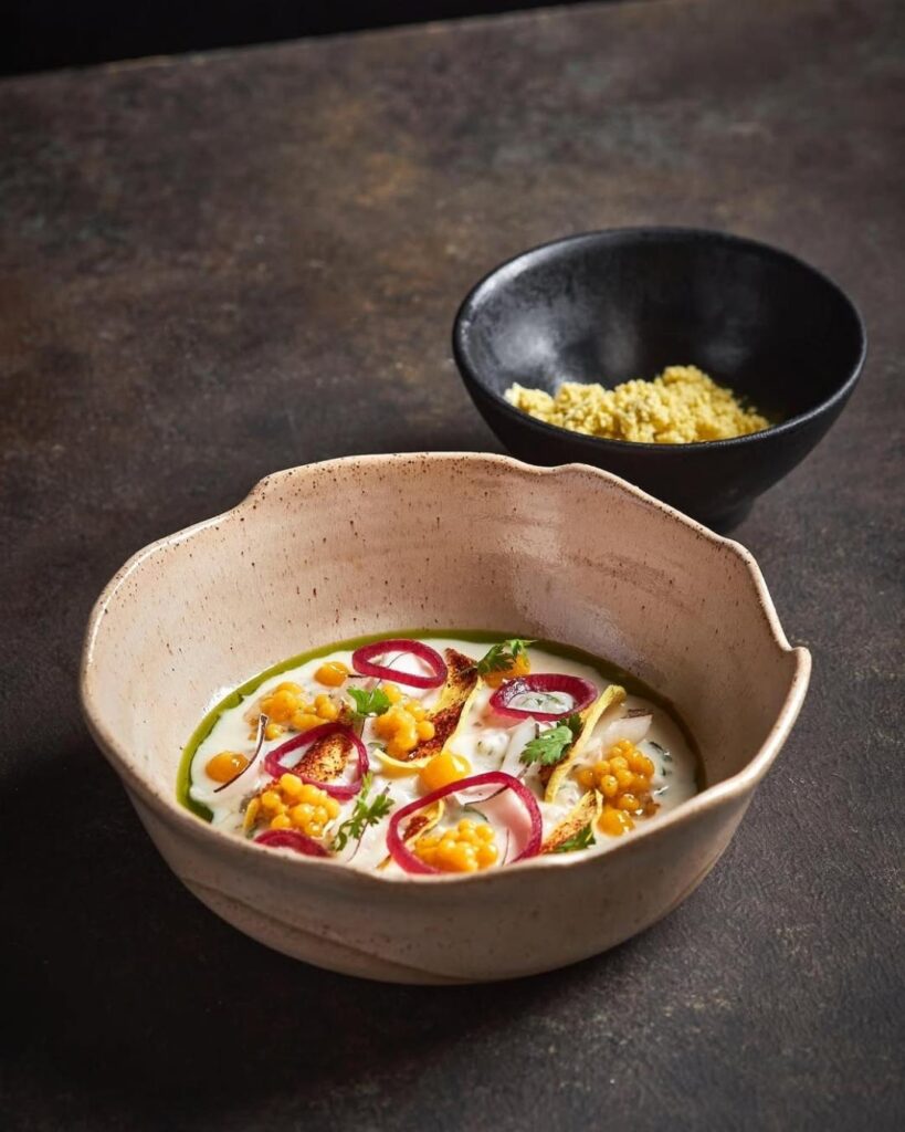 A bowl of food on a table