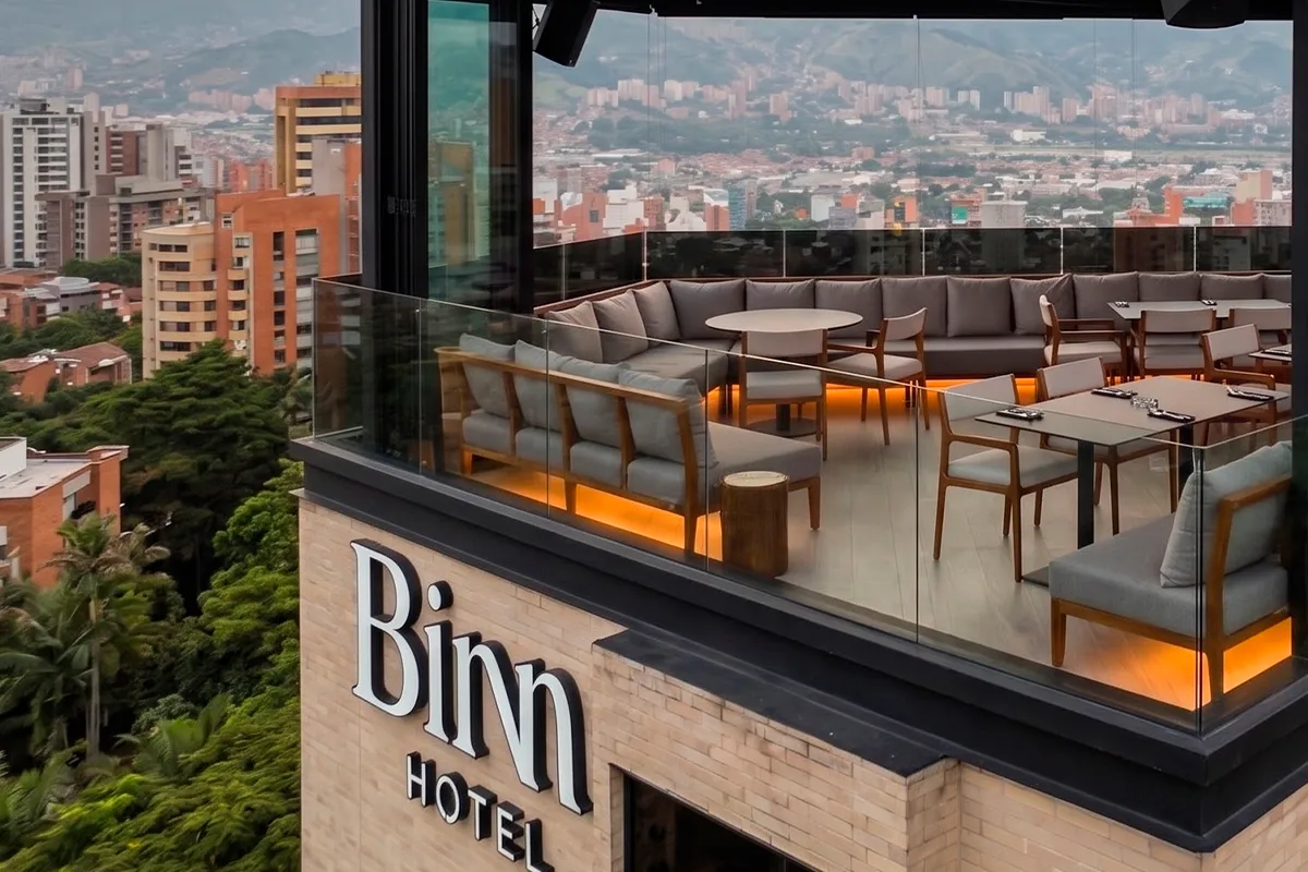 Aerial view of Etro Rooftop atop Binn Hotel overlooking the Aburra Valley.